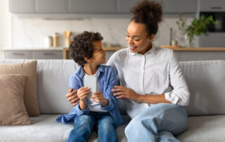 Parent engaging with child at home, supporting development through aba therapy for children with autism in Maryland