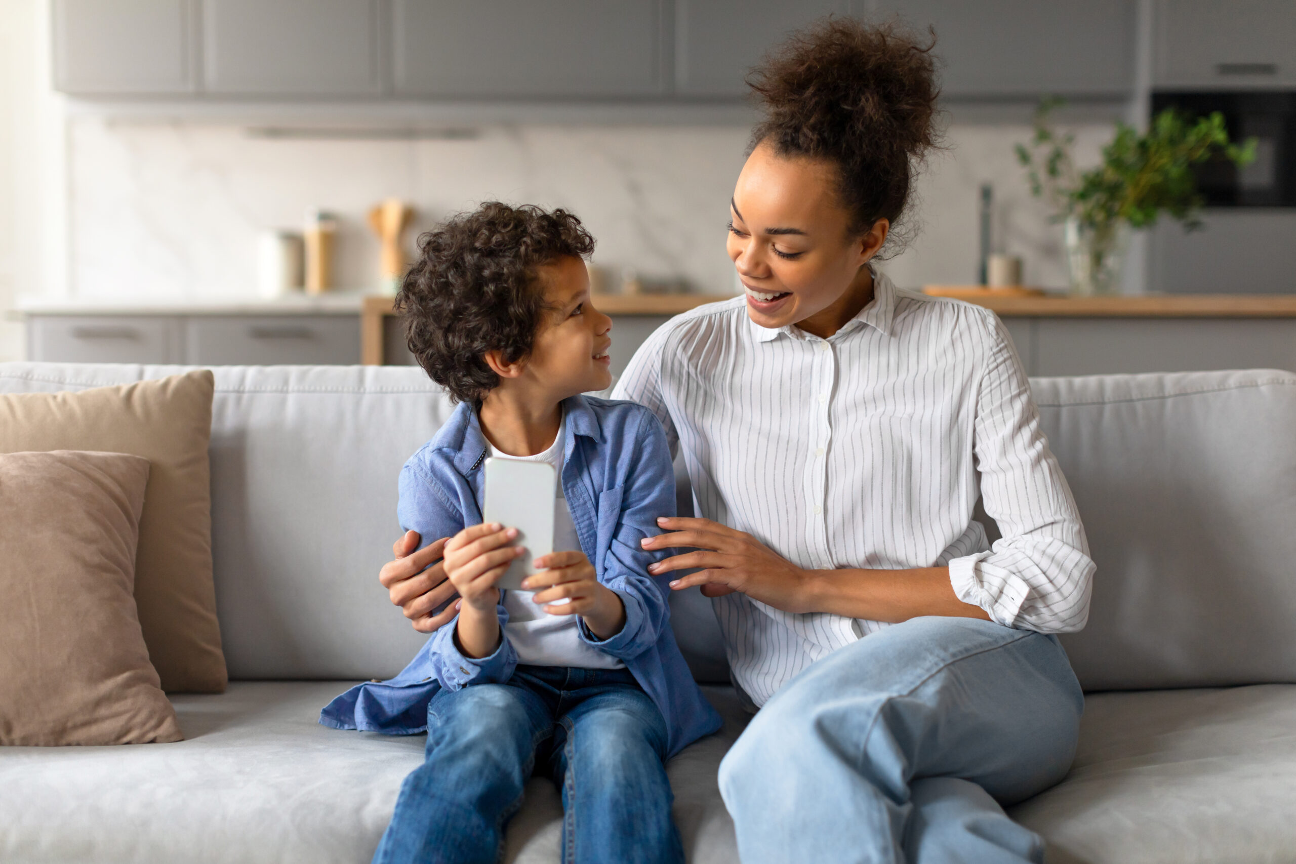 Parent engaging with child at home, supporting development through aba therapy for children with autism in Maryland