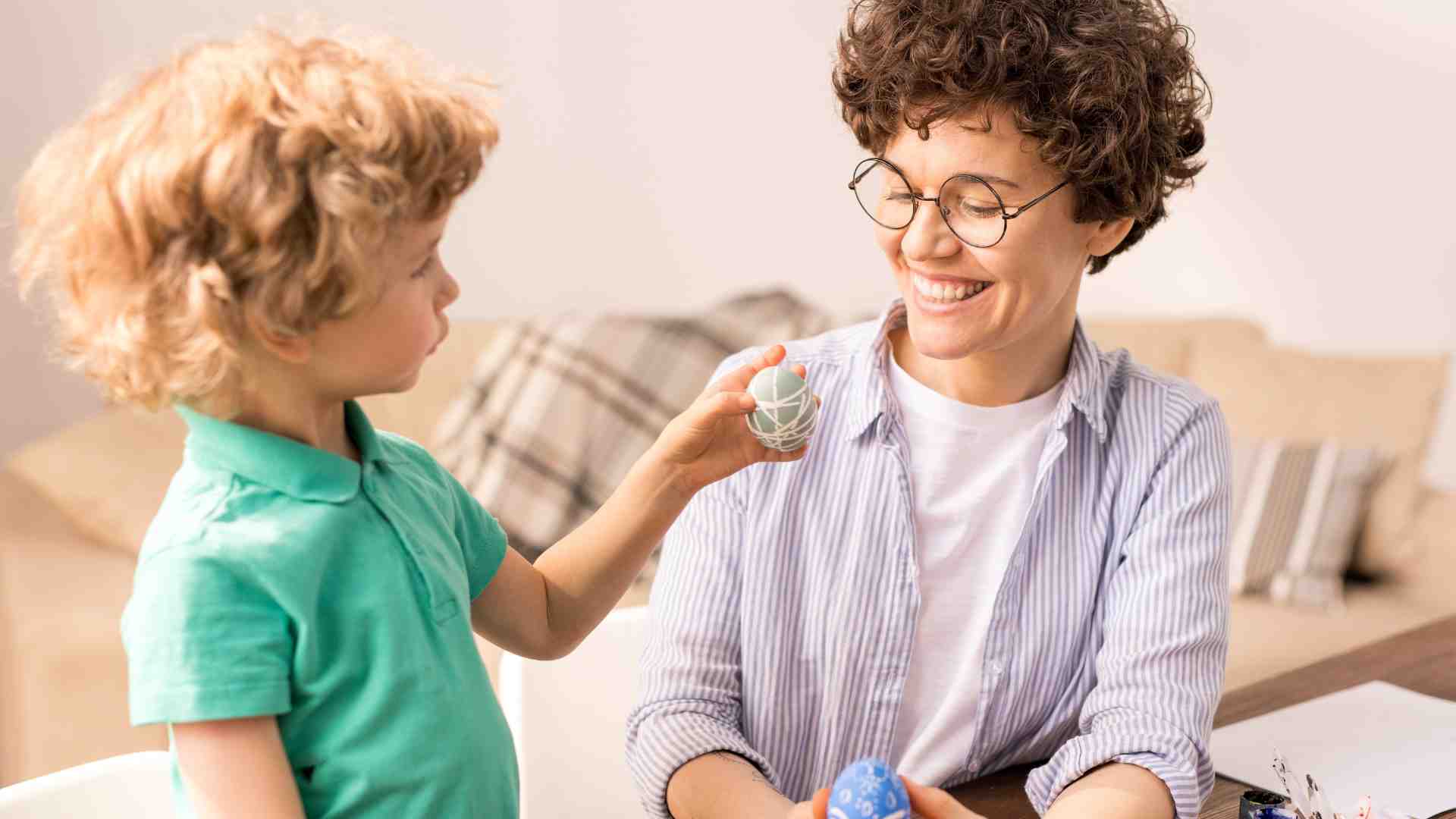 Child engaging in applied behavior analysis near me session with therapist during play-based learning activity
