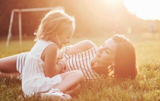 Parent and child enjoying outdoor play as part of autism-friendly activities in Maryland supporting development and connection