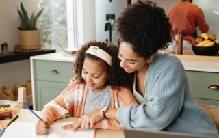 Mother reading with young child at home, showing supportive autism resources for parents in Maryland and early learning development