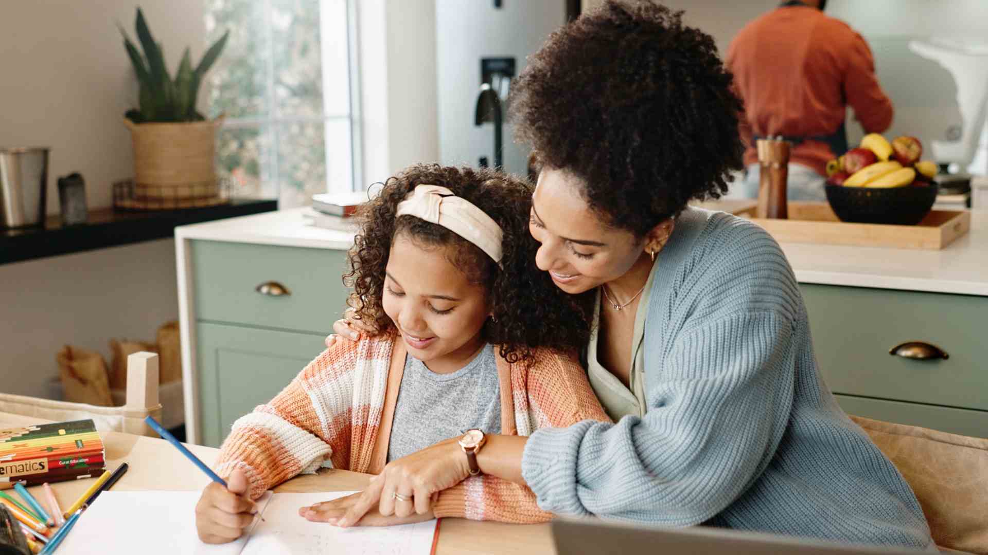 Mother reading with young child at home, showing supportive autism resources for parents in Maryland and early learning development